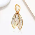 Handcrafted pearl shell brooch with gold wire wrap and iridescent wing accents - Gold Handmade Wire Wrap Pearl Shell Style (XX0182)