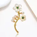 Elegant gold flower brooch with white shell petals, green stone center and four pearls - Gold MOP Dark Green Gem Flower Style (XX0216)