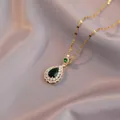 Elegant gold-plated heart necklace with green teardrop gemstone and white zircon halo - Emerald Teardrop Pendant (X2851) / Gold