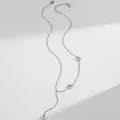 Silver Y-necklace detail showing three rings engraved with BEAUTY and a B letter tag - Barrel Snake Chain / Steel