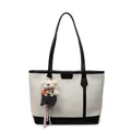 Minimalist woven tote bag in white and black with a cute plush bear charm accessory - White and Black