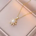 Collier en acier titane doré avec pendentif soleil, serti de perles et de zircons - X1077-fleurs