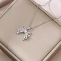 Detail of silver butterfly pendant with blue crystal and zircon inlays on gift box - Bowknot Rectangle Zirconia Style (X0282 Steel Color)