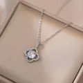 Elegant silver four-leaf flower necklace with sparkling zircon stone on jewelry box - Clover Micro Pave White Zirconia Style (X0219) / Silver