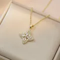 Elegant gold titanium steel necklace featuring a sparkling four-leaf zircon pendant in a gift box - Gold Four-Leaf Flower Necklace
