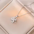 Elegant rotating clover pendant necklace in silver with sparkling zircon stones - Silver Rotating Four-leaf Clover Style (X0503)