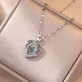 Elegante silberne Herzkette mit blauem Zirkonia-Anhänger in Schmuckschatulle - Tanzendes Herz Herz Anhänger Halskette (X0357)
