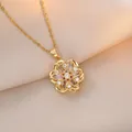 Elegant gold flower rotating zircon pendant necklace on luxury champagne silk fabric - Gold Eight-petal Flower Zirconia Style (X0637)