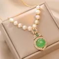 Elegante ciondolo in zircone smeraldo con perle d'acqua dolce su collana in acciaio titanio - Smeraldo