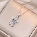Silver crown bear pendant necklace with sparkling zircons on elegant champagne silk base - Steel