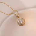 Elegant gold necklace with sparkling round zircon pendant on luxury silk fabric background - Sunflower Zircon Necklace (X0974) / Gold
