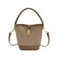 Retro color-block bucket bag in dark brown suede and smooth leather with gold twist lock - Brown