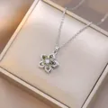 Rotating silver necklace with five-petal flower pendant featuring green zircon stones - Silver Olive Green Floral Style (X1010)