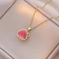 Elegant gold heart pendant necklace with pink stone and white zircon accents - Gold - Red Rotating Heart (X1181)