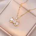 Elegante gouden strik ketting met zirkonia stenen op een luxe sieraden geschenkdoos - Strik Ketting / Goud