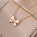Elegant gold bow pendant necklace with zircon crystals in a brown jewelry gift box - Bow-knot Necklace (X1618)