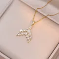 Macro detail of a gold mermaid tail necklace with marquise-cut zircon stones in a jewelry box - Gold White Mermaid Tail (X1471) / Gold