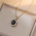 Elegante collar de titanio dorado con colgante de piedra negra ovalada y halo de cristales - Colgante Negro Solamente (Sin Cadena) (X1313)