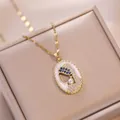 Exotic gold oval necklace featuring white enamel, blue zircon, and a pearl accent - Gold - Virgin Mary Style