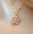 Rotating pink zircon flower necklace with gold-plated chain and sparkling crystals - Pink Flower Necklace