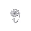 Eleganter silberner Blumenring mit funkelndem Zirkonia auf weißem Hintergrund - Silberner rotierender Blumenring Offen (J0771)