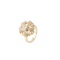 Macro detail of rotating gold flower pendant with sparkling zircon micro-pave setting - Gold Hollow Floral