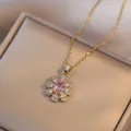 Pink zircon flower pendant necklace in gold finish displayed in a luxury jewelry gift box - Pink Flower Pendant Necklace / Pink Zirconia Necklace