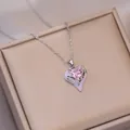 Halskette mit rosa Kristallherz und Silberkette auf einer Champagner Seidenbox - Herzanhänger Halskette / Silber