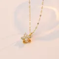 Rotating golden flower necklace with zircon petals on a stainless steel chain for women - Rotating Flower Pendant Necklace / Gold (X0059)