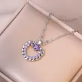 Élégant collier argenté avec pendentif coeur évidé et pierres de zircon violettes - Collier Coeur Violet (Couleur Acier)