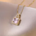 Elegant gold necklace with square pink gemstone pendant on champagne silk background - Princess Cut Pink Main Stone (X2727) / Gold