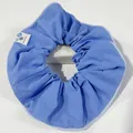 Blue fabric oversized scrunchie with success label and minimalist floral design - Blue