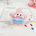 Élastique en peluche étoile rose avec yeux de monstre rigolos et bouche bleue - Étoile Rose