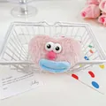 Pink heart-shaped plush monster scrunchie with cute cartoon eyes and blue sausage lips - Pink Heart