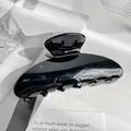 Classic glossy black acrylic hair claw clip for elegant updo hair styling for women - Black