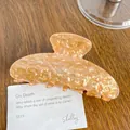 Creamy orange jelly acrylic hair claw clip with marble texture for elegant styling - Quicksand Orange