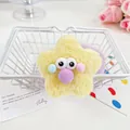 Chouchou peluche étoile jaune avec de grands yeux et boules de fourrure colorées - Étoile Ronde Jaune