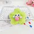 Chouchou étoile en peluche monstre vert avec de gros yeux dans un panier déco - Étoile Ronde Verte