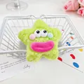 Chouchou en peluche monstre étoile vert néon avec de grands yeux et air rigolo - Étoile Verte