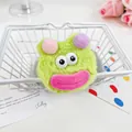 Chouchou monstre vert en peluche avec grands yeux et pompons colorés pour cheveux - Tête de Poupée Verte