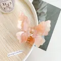 Pink acetate butterfly hair claw clip with marble texture and golden spring detail - 7.5cm / Peach Pink