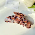 Floral butterfly hair claw clip with orange and black marbled texture for women - 11cm Brick Red