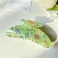 Translucent light green acetate hair claw clip with colorful floral daisy pattern - 11cm Floating Flower Green