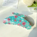 Blue butterfly hair claw clip with pink floral patterns in a translucent finish - 11cm Cyan Floral