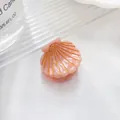 Pink shell-shaped mini hair claw clip with golden marble texture and elegant finish - Nude Pink (2.5cm)