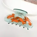 Mini pince à cheveux en acétate avec motif de poisson rouge orange en bleu translucide - Grande Pince à Cheveux - Quatre Poissons