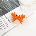 Simpatica molletta per capelli a granchio in acetato arancione con effetto marmo - Piccolo Granchio