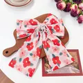 Pasador de lazo floral con estampado de flores rosas y detalle de cuentas en madera - Lazo Grande de Cristal