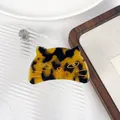 Pince à cheveux chat en acétate écailles de tortue avec détails dorés élégants - Écaille Café