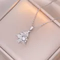 Silver rotating Christmas tree necklace with sparkling zircon snowflake pendant detail - Steel Color Christmas Tree Rotating Necklace (X1452)